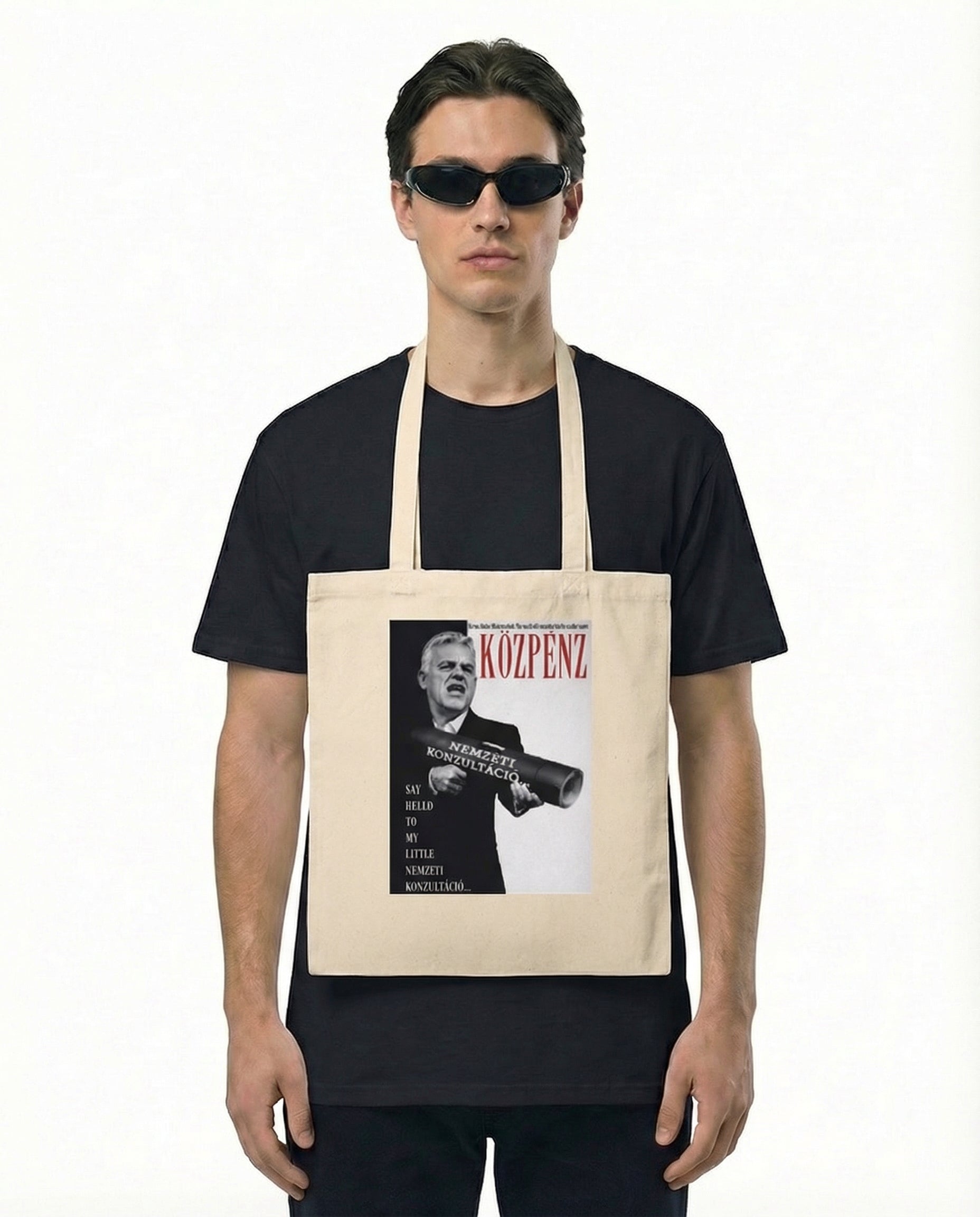 Közpénzarcú™ táska — erős fülekkel, erős állásponttal